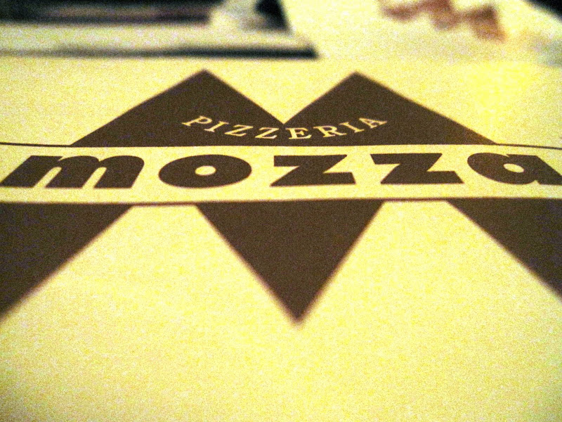 Close up of Pizzeria Mozza logo