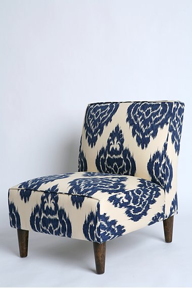 Vintage-inspired armless slipper chair covered in indigo ikat print cotton fabric from Urban Outfitters