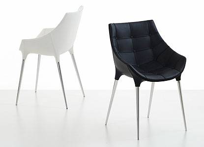 Two Pilippe Starck chairs one in black the other in white from Cassina