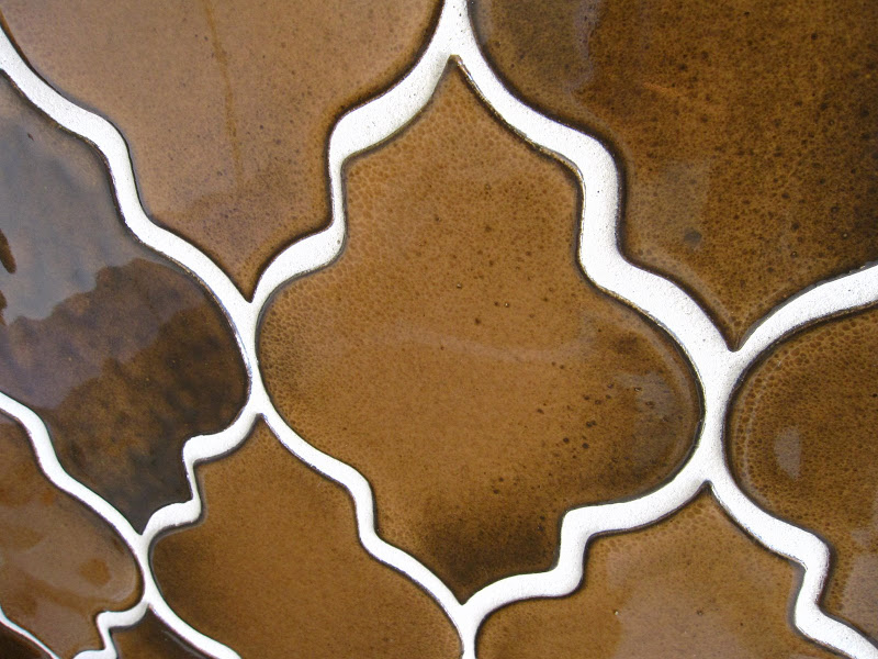 Close up of the bronze glazed tiles