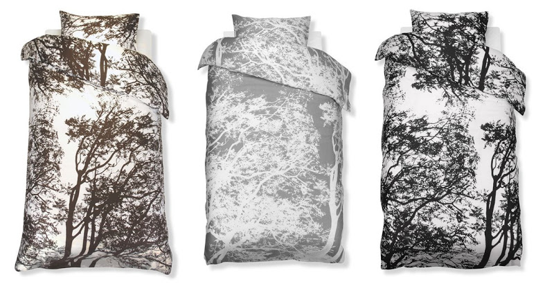 Three patterned duvet covers from Marimekko with graphic tree paterns by Maija and Kristina Isola