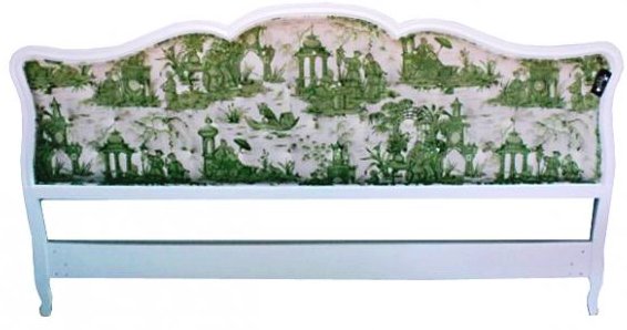 White vintage headboard upholstered in green and white toile fabric from Red House Interiors