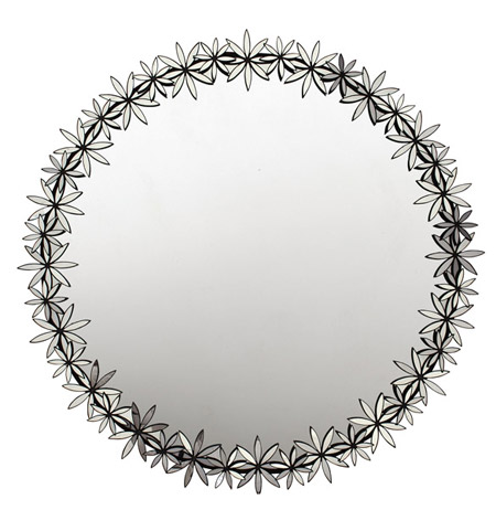 Round mirror with mirrored detailing around the rim from Oly