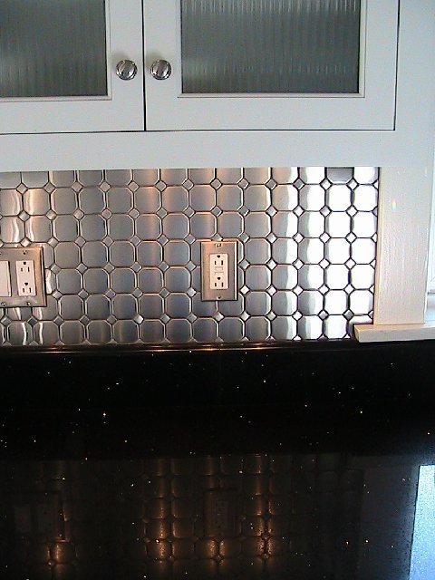 Kitchen after remodeling with stainless steel tile Diamond Tech-Metal Series Mosaic Octagon Dots backsplash