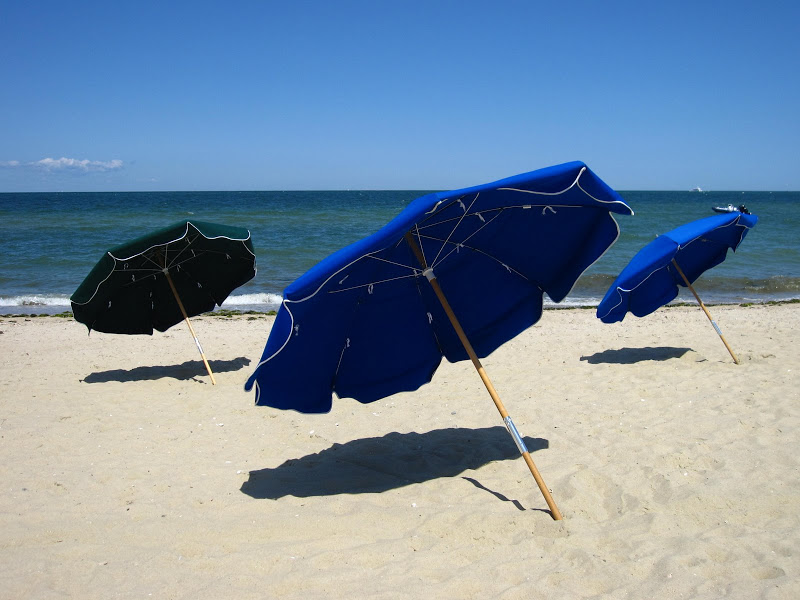 Blue and green umbrellas at the Cliffside Beach Club in Nantucket 