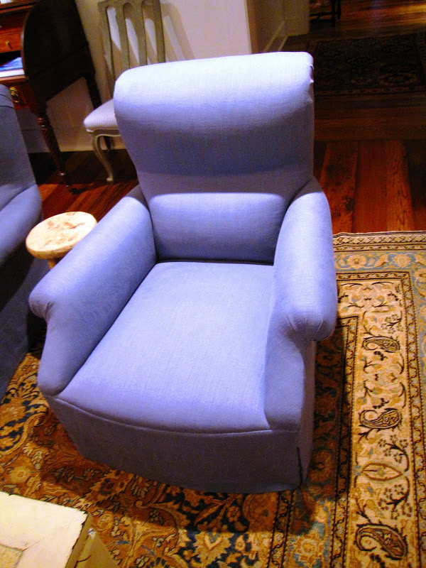 Classic blue armchair in a sitting room at the Great Harbor Yacht Club