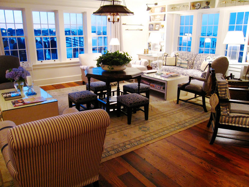 Main living room in the Great Harbor Yacht Club with French paned windows, hard wood floor and lots of seating