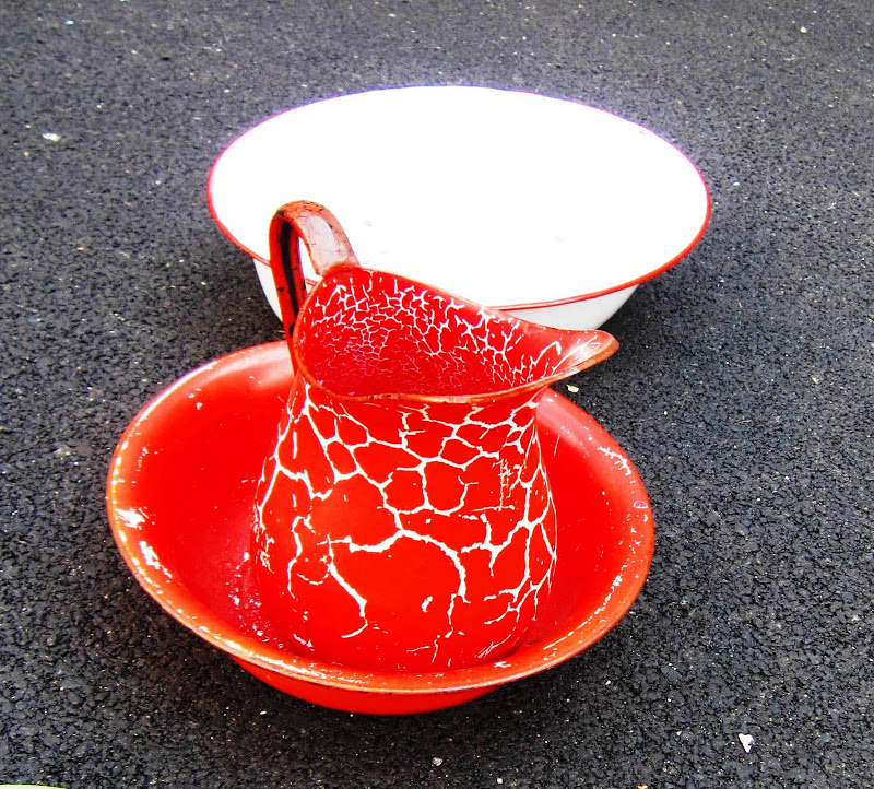 Red enamel and metal pitcher and bowl 