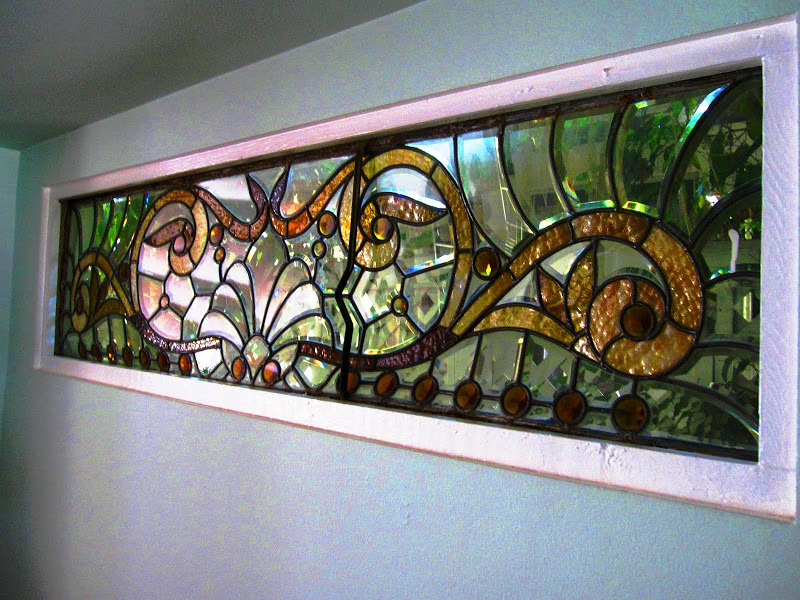 Rectangular stained glass window in a dining room