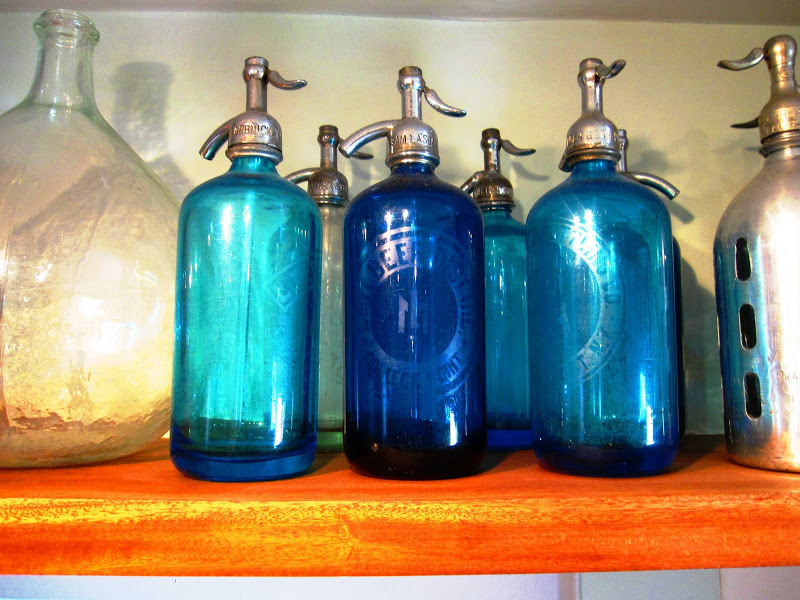 Vintage blue seltzer bottles
