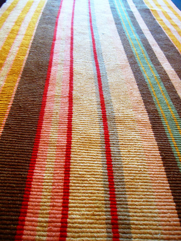 Striped rug in a gallery kitchen