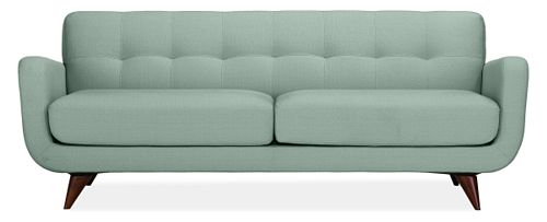 Mint mid-century modern 1950's style sofa with tufted back and curved sides from Room and Board