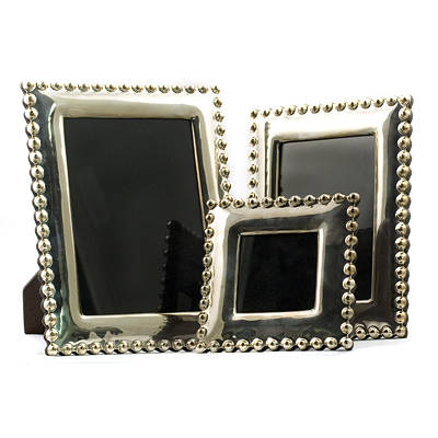 Three Madeline Weinrib Sterling Silver Picture Frames from auto