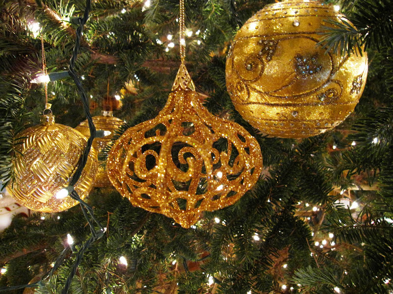 Close up of ornaments on a formal Christmas tree in the Front Hall of a historic New Orleans mansion