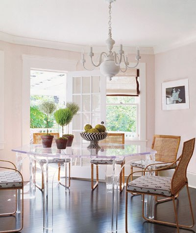 Dining room in Timothy Whealon's Hamptons home with a custom octagonal lucite dining table