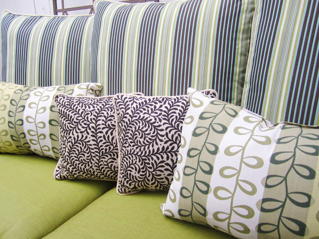Outdoor accent pillows in a mix of playful prints
