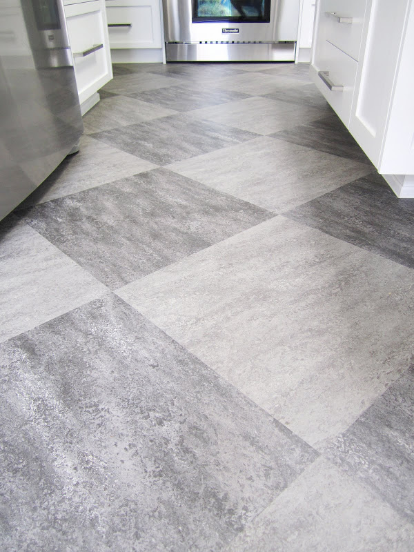 Grey Marmoleum tile floor arranged in a diagonal pattern in a kitchen