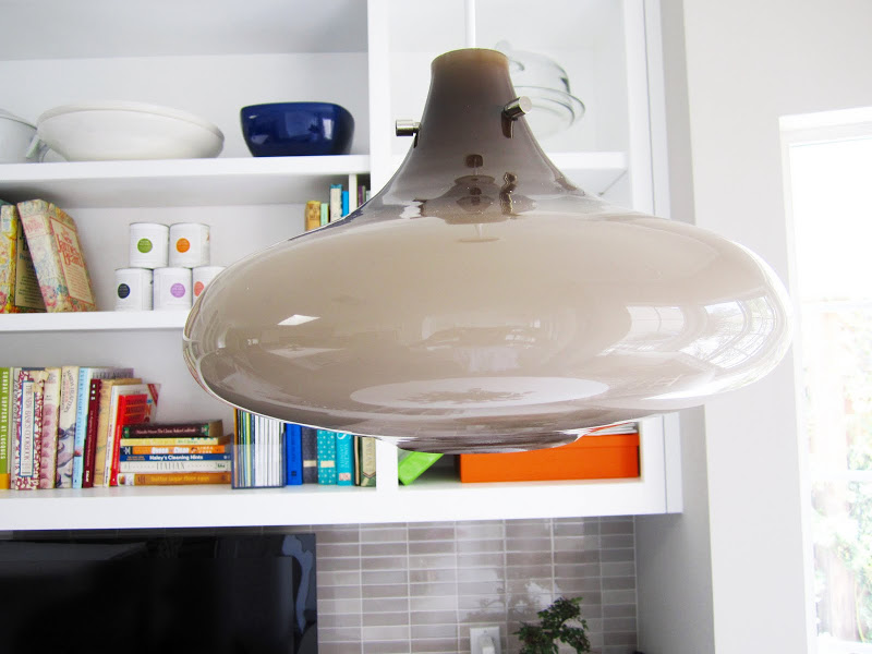 Grey pendant light in a gorgeous and functional kitchen