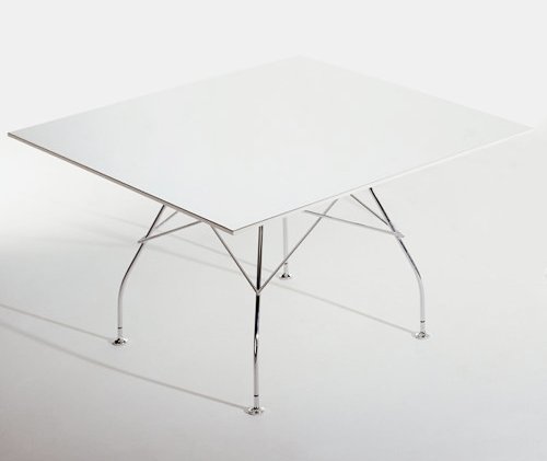 White glossy dining table with chrome legs from y living