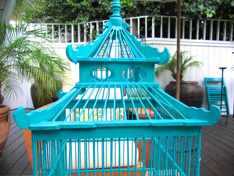 Top of a custom painted teal Chinoiserie inspired wood bird cage