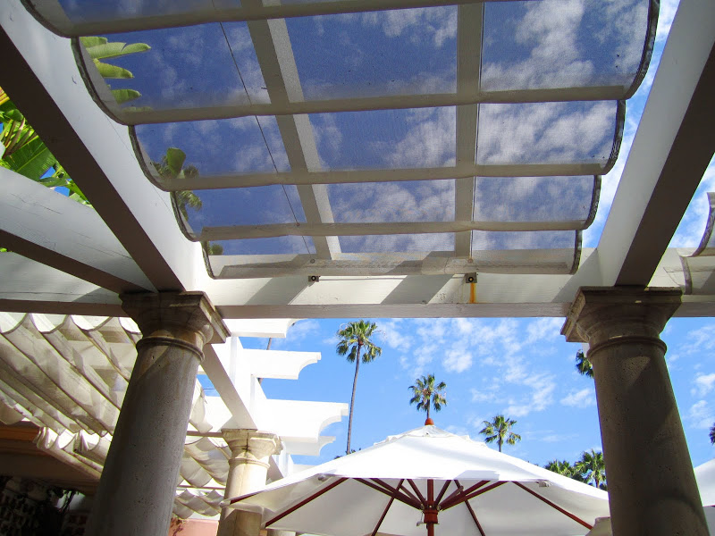 Blue sky throw a wavy canopy at the Beverly Hills Hotel Pool resturant
