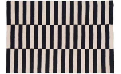 Black and white rug with a drop step pattern