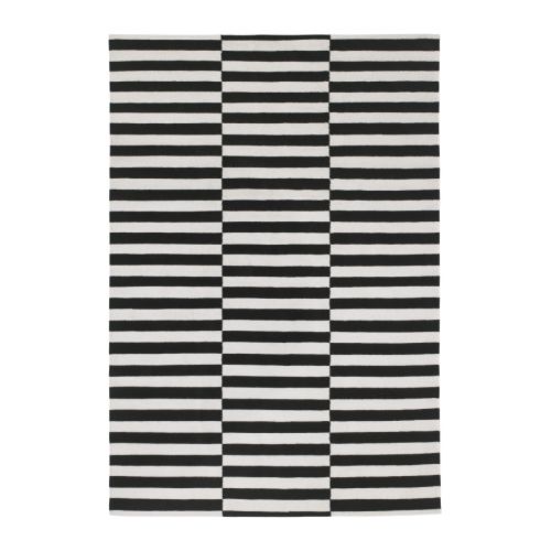 Black and white rug with a drop step pattern