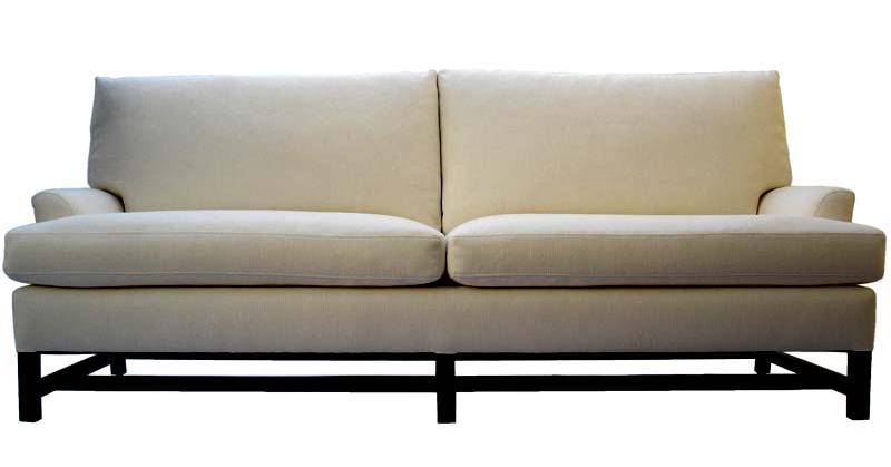 White sofa with black exposed legs from Plush Home