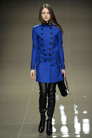 Model from Burberry's Fall Ready-to-Wear 2010 wearing a royal blue military jacket