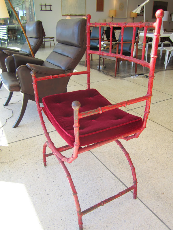 Close up of the 1950's vintage red metal faux bamboo chair