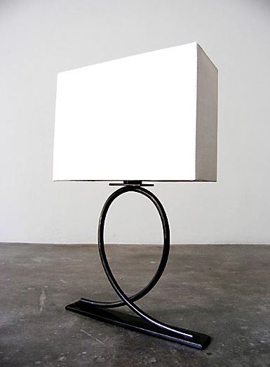 Iron based loop table lamp with white linen shade