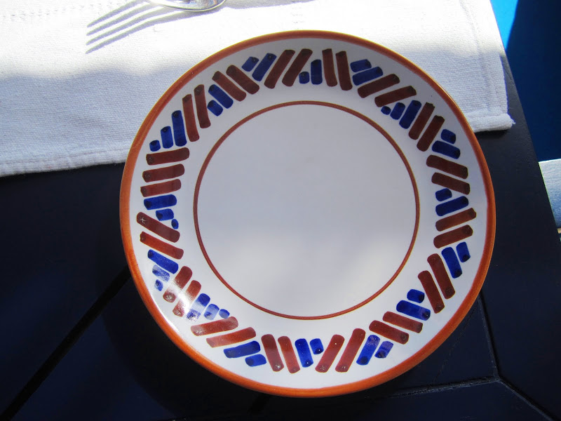 Close up of a blue, red and white plate at a restaurant in Mexico