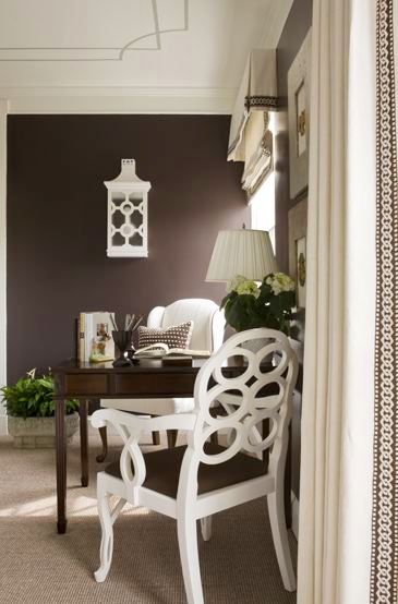 Sitting room with painted ceiling, grey carpet, brown walls, white armchair, white Frances Elkin lacquer chair and white curtains with brown and white embroidered trim