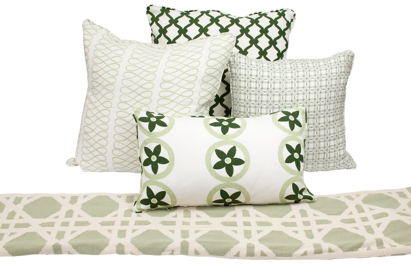 Mix of COCOCOZY pillows and throws all in green