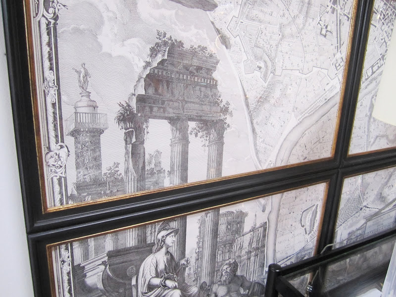 Close up of an old map cut up and framed in sections
