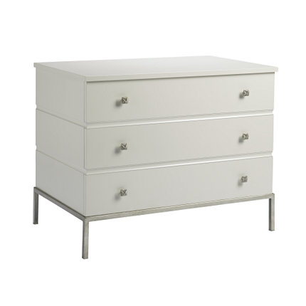 3 drawer nightstand made from cherry solids with silver finish drawer pulls, a metal platform and four square, silver finished legs