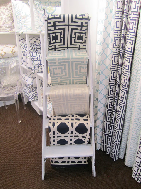 COCOCOZY throws arranged on a ladder at the New York International Gift Fair