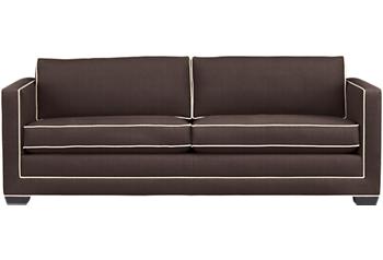 Chocolate brown sofa with white contrast piping from Crate and Barrel