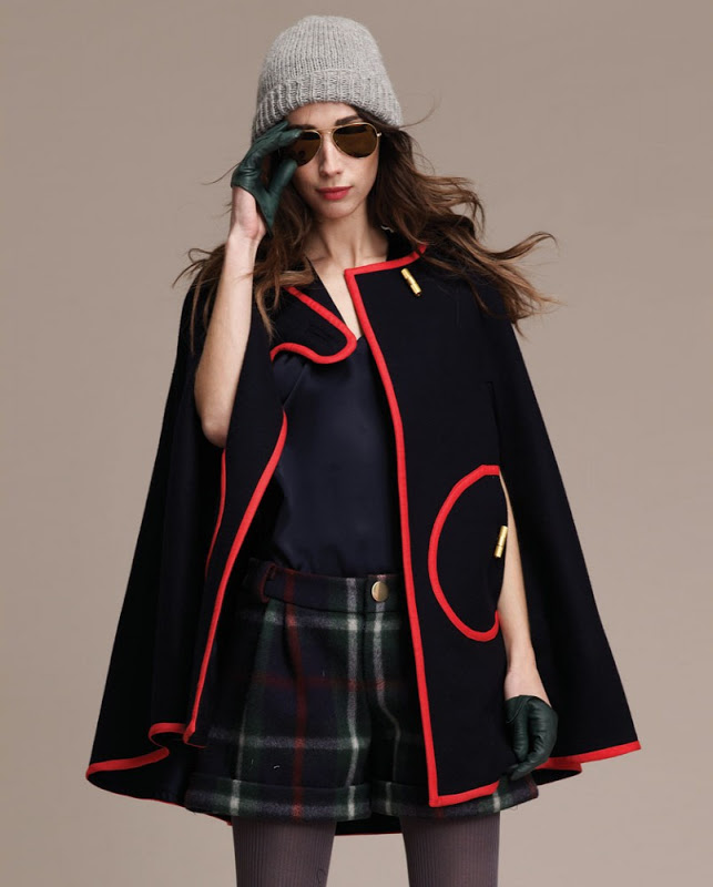 Military inspired cape with red piping from Lauren Moffat