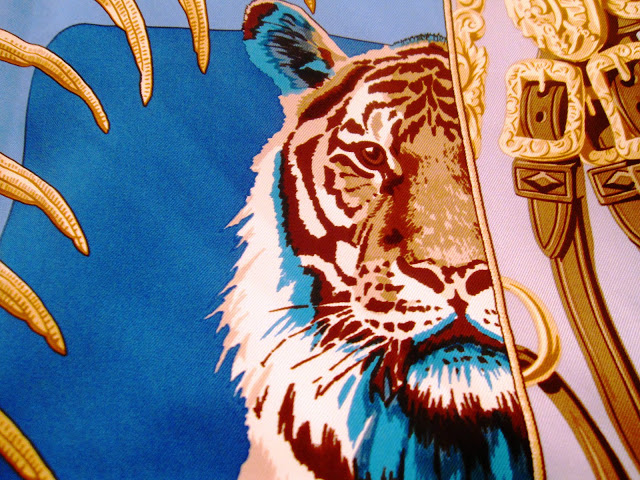 Close up of the tiger on the Hermes' Carre en Carres scarf
