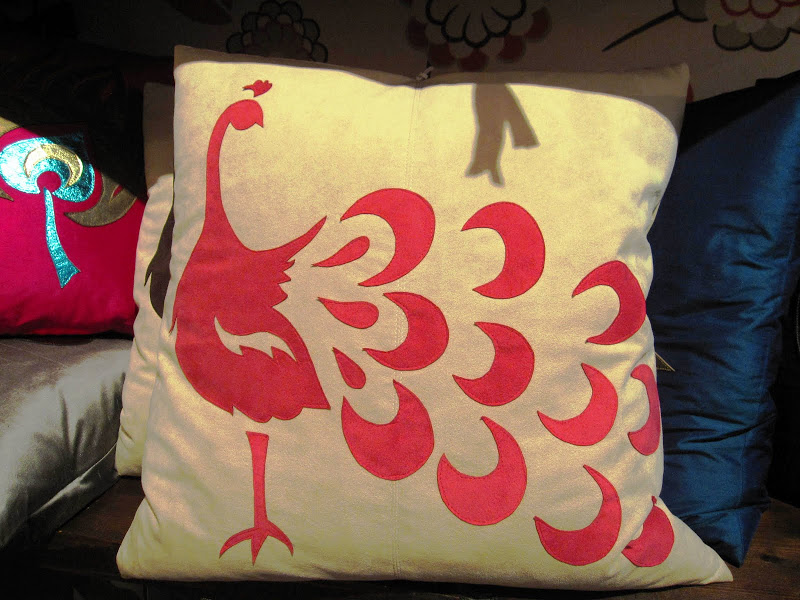 Silk pillow with a bright pink peacock from Michele Varian