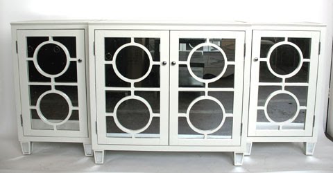 Three part lacquered wood cabinet with circle detailing and mirrored panels from C Bell Furnishing