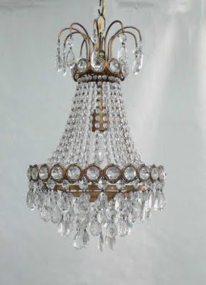 Traditional chandelier made of crystal and brass from Maison Luxe